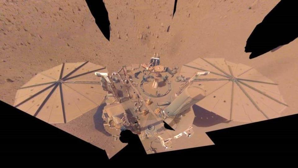 A selfie from the InSight rover on Mars showing its dusty solar panels. Insight sent one final message.