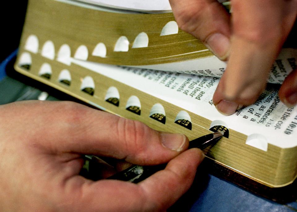 One of about 1,000 Bibles is being thumb-indexed by hand during the day at the Thomas Nelson Inc. plant in Nashville Feb. 28, 1996. The company is the largest producer of Bibles in the United States.