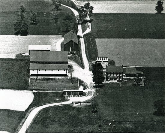 This aerial view of the Horn Farm, believed to come from the late 1950s, shows the barn that burned in 2005 and the farmhouse that sustained major fire damage in October.