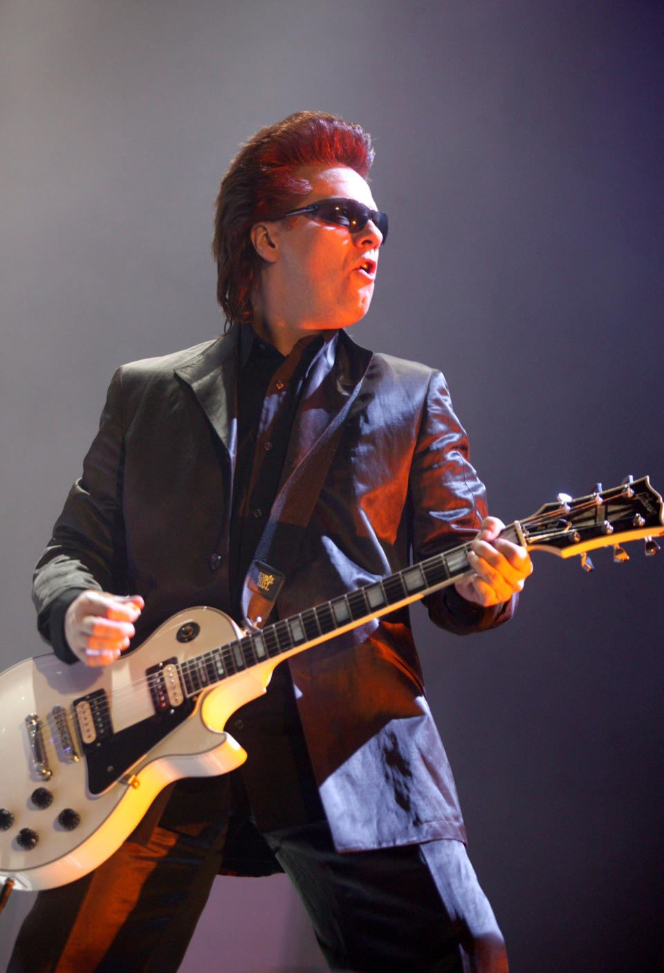 Andy Taylor of Duran Duran performs on stage during the first London date of their UK tour at Wembley Arena on April 13, 2004. (Getty Images)