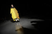 A model wears a creation as part of the Sunnei men's Fall-Winter 2020/21 collection, that was presented in Milan, Italy, Sunday, Jan. 12, 2020. (AP Photo/Luca Bruno)