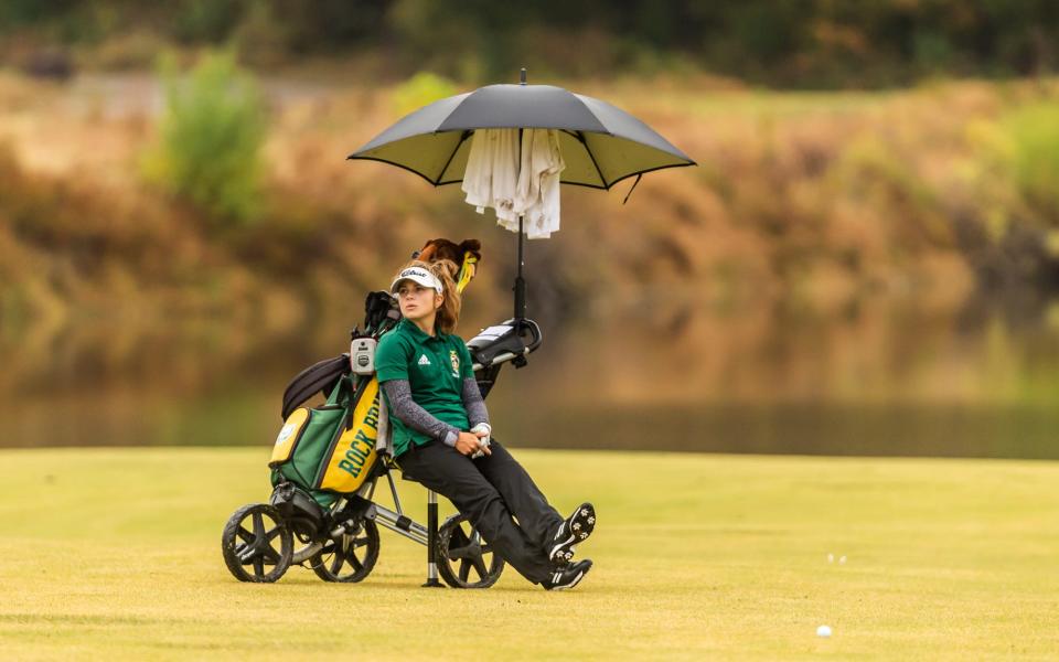 Rock Bridge's Tierney Baumstark relaxes while waiting on the 10th hole during the Class 4 girls golf championships in 2020 at Dalhousie Golf Club in Cape Girardeau.