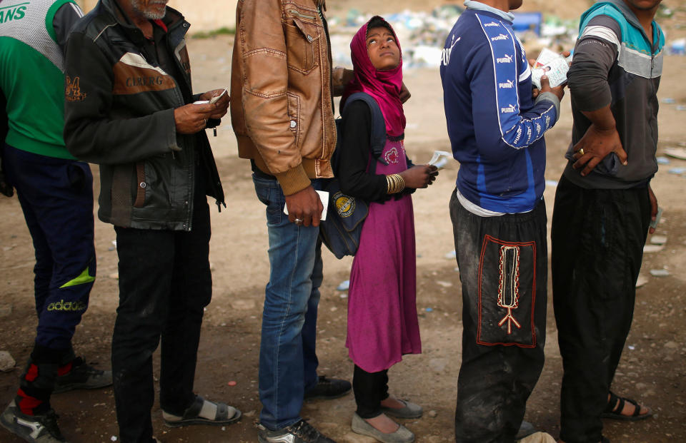 Waiting for food in Mosul