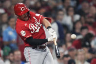 Cincinnati Reds' Spencer Steer connects for a two-run home run during the seventh inning of the team's baseball game against the Boston Red Sox at Fenway Park, Wednesday, May 31, 2023, in Boston. (AP Photo/Charles Krupa)