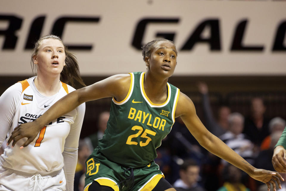 Baylor center Queen Egbo (25) blocks out Oklahoma State center Kassidy De Lapp (1) during a free throw in the first half of an NCAA college basketball game in Stillwater, Okla., Saturday, Feb. 15, 2020. (AP Photo/Brody Schmidt)