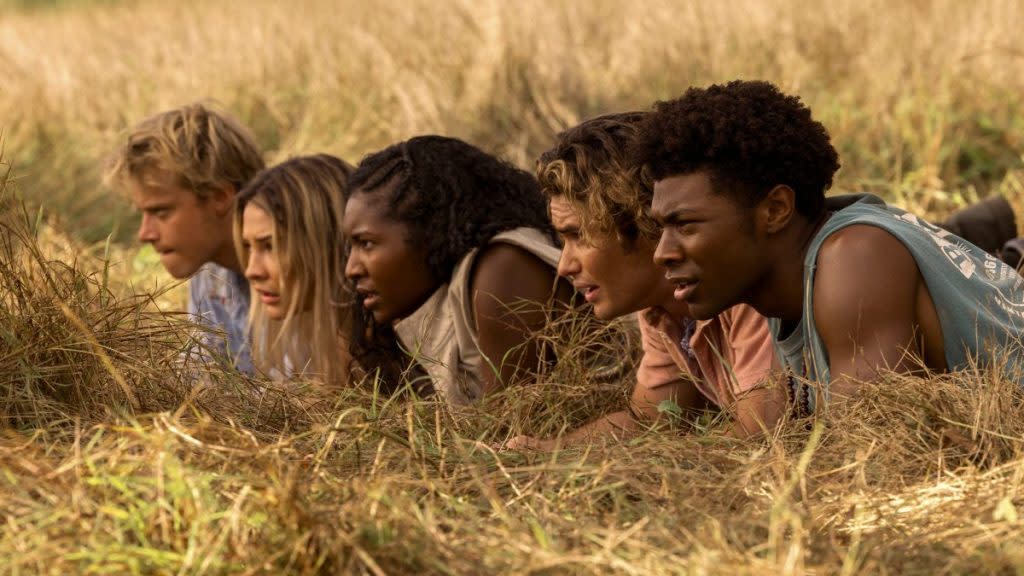 Outer Banks. (L to R) Rudy Pankow as JJ, Madelyn Cline as Sarah Cameron, Carlacia Grant as Cleo, Chase Stokes as John B, Jonathan Daviss as Pope in episode 301 of Outer Banks. Cr. Jackson Lee Davis/Netflix © 2022