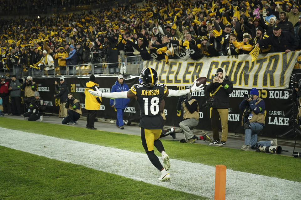 Pittsburgh Steelers wide receiver Diontae Johnson (18) celebrates a touchdown against the Tennessee Titans during the second half of an NFL football game Thursday, Nov. 2, 2023, in Pittsburgh. (AP Photo/Matt Freed)