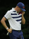 United States' Justin Thomas dries his sweat during the first round of the men's golf event at the 2020 Summer Olympics on Wednesday, July 28, 2021, at the Kasumigaseki Country Club in Kawagoe, Japan. (AP Photo/Matt York)