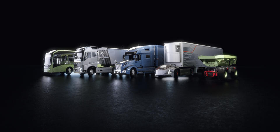 Rendering of six different Volvo autonomous vehicles, including several trucks and a bus.