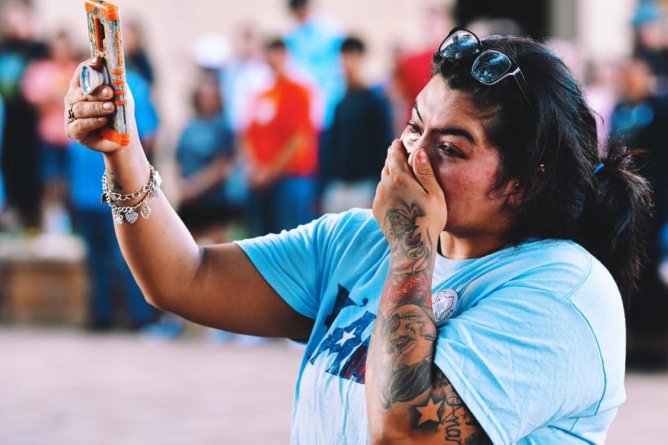 <div class="inline-image__caption"><p>A mourner attends a vigil for victims of the mass shooting in Odessa, Texas, on Sunday September 1, 2019.</p></div> <div class="inline-image__credit">Justin Hamel for The Daily Beast</div>