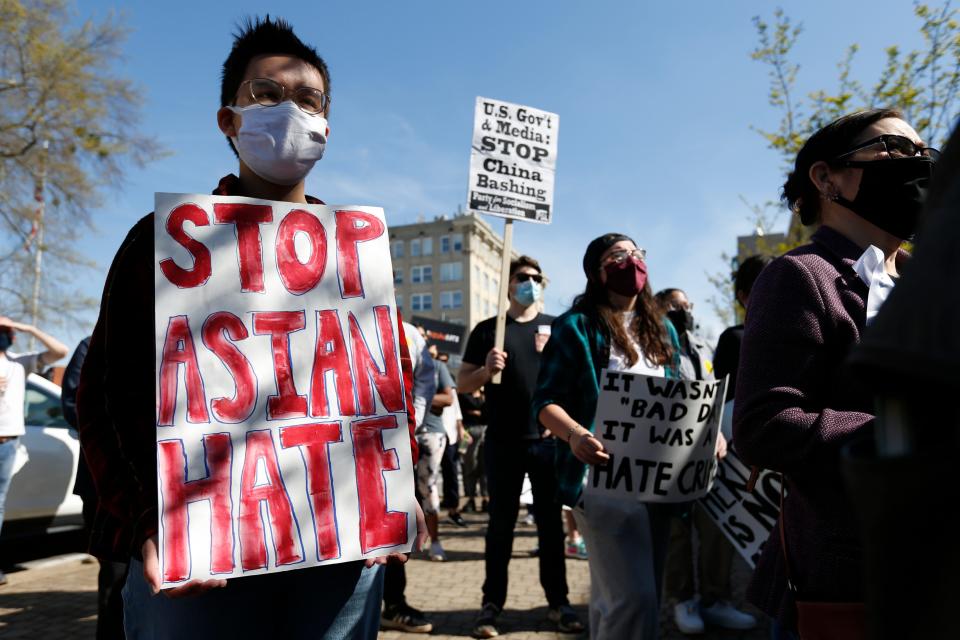 Protesters gather at City Hall during a rally and march against anti-Asian hate April 3, 2021, in downtown Athens, Ga. Protesters called for gun control measures to prevent mass killings like the Atlanta spa shootings that March.