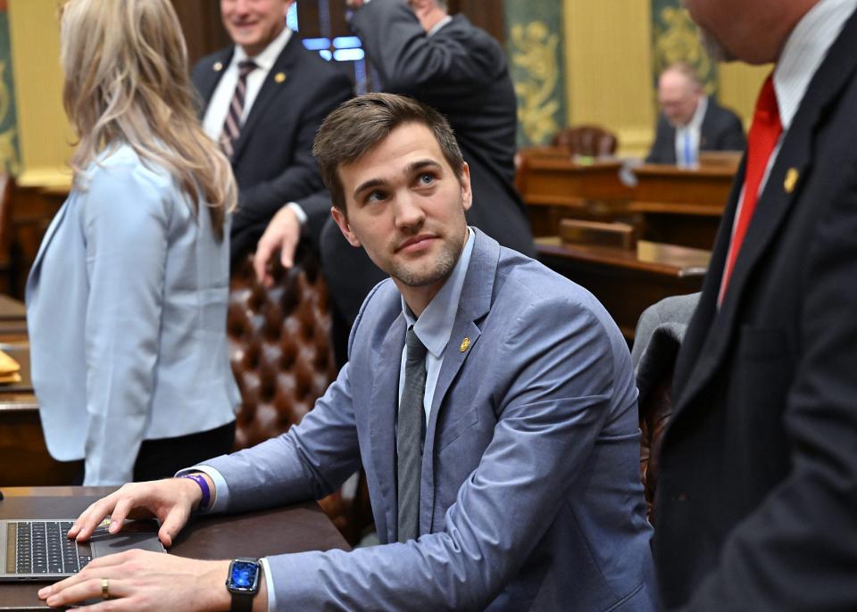 State Rep. Josh Schriver, Oxford, sits in the Michigan House of Representatives chamber.