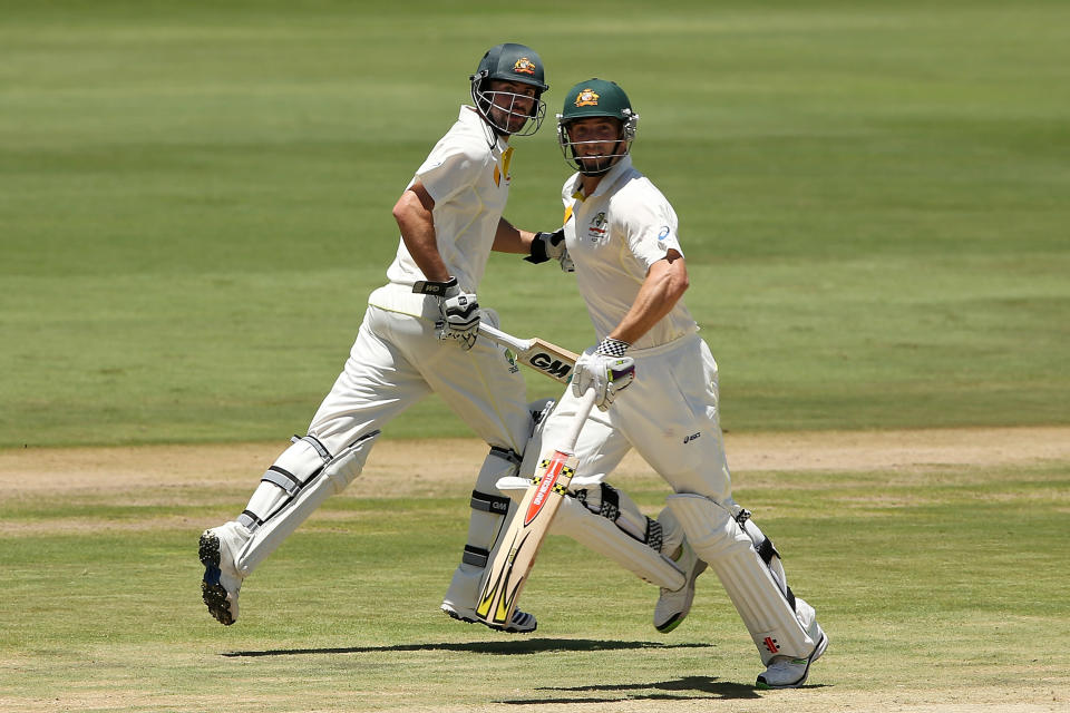 Shaun Marsh and Alex Doolan of Australia run between the wickets during day one of the First Test match between South Africa and Australia on February 12, 2014 in Centurion, South Africa. (Photo by Morne de Klerk/Getty Images)