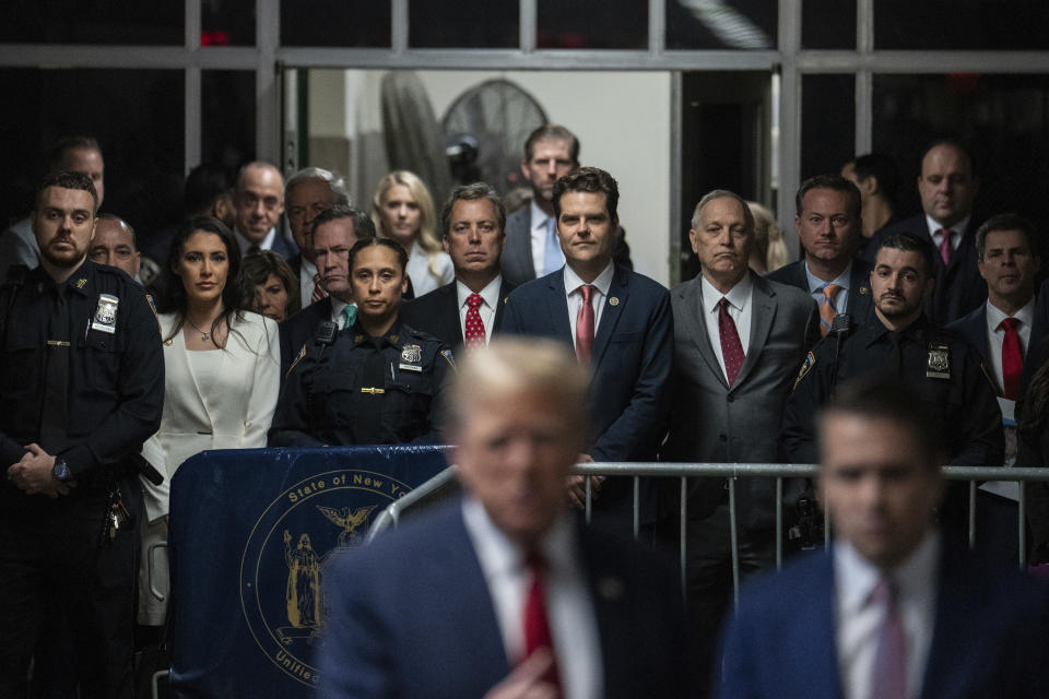 Rep. Matt Gaetz, R-Fla.,looks on as former President Donald Trump talks with the media at Manhattan criminal court in New York, on Thursday, May 16, 2024. (Jeenah Moon/Pool Photo via AP)