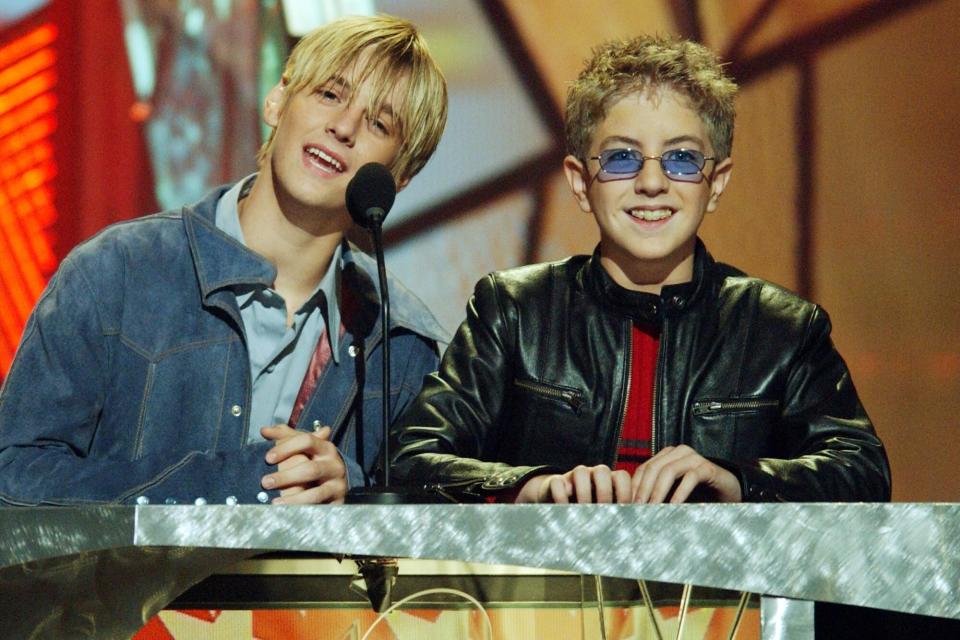 Aaron Carter and Billy Gilman introduce an act at the 2001 Billboard Awards at the MGM Grand Hotel in Las Vegas. (Photo by M. Caulfield/WireImage)