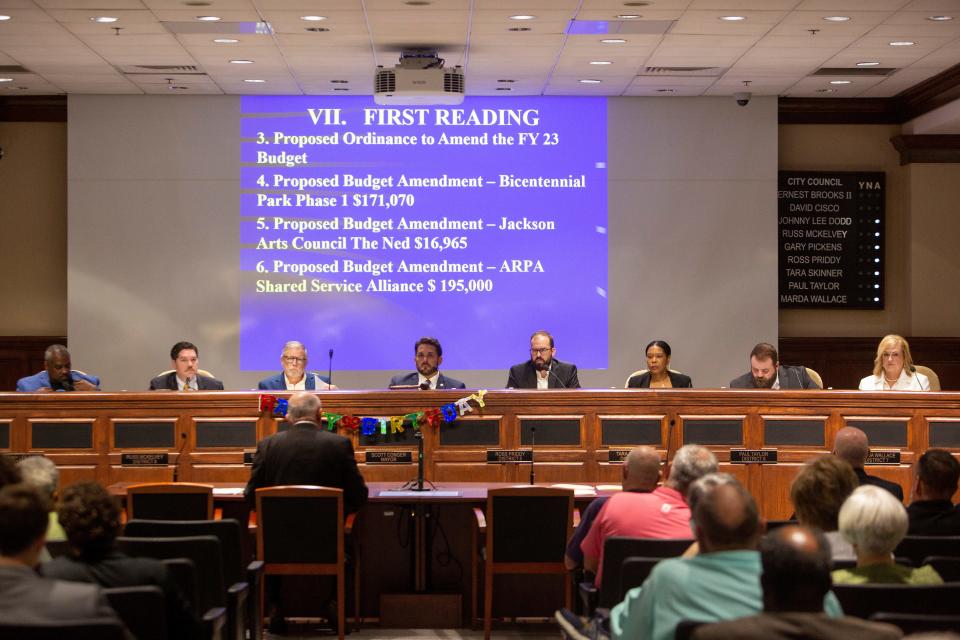 City councilmembers and Mayor Scott Conger listen to a speaker during a city council meeting on August 2, 2022, in Jackson, TN. 