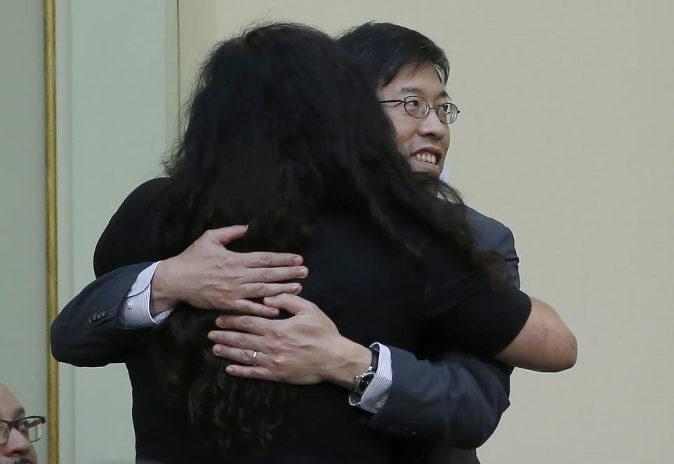 State Sen. Richard Pan, D-Sacramento, is hugged by Assemblywoman Lorena Gonzalez, D-San Diego, to tighten the rules on giving exemptions for vaccinations was approved by the Assembly in Sacramento, Calif., Tuesday, Sept. 3, 2019. The bill SB276, would give state public health officials oversight of doctors who give more than five medical exemptions annually and schools with vaccination rates less than 95%. It still needs a final approval in the state Senate. (AP Photo/Rich Pedroncelli)