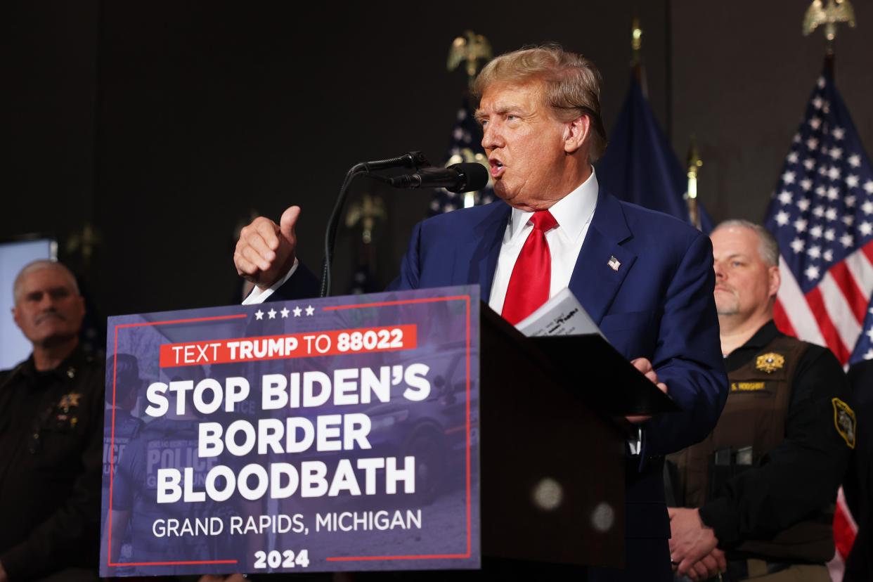 GRAND RAPIDS, MICHIGAN - APRIL 02: Former U.S. President Donald Trump speaks at a campaign event on April 02, 2024 in Grand Rapids, Michigan. Trump delivered a speech which his campaign has called "Biden's Border Bloodbath", as recent polls have shown that immigration and the situation at the U.S. Southern border continue to be top issues on voters' minds going into the November election. (Photo by Spencer Platt/Getty Images)