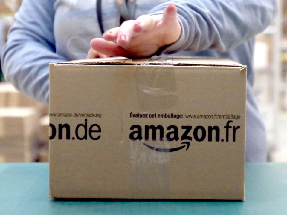 File photo dated 28/11/13 of an Amazon package being prepared at an Amazon warehouse: PA