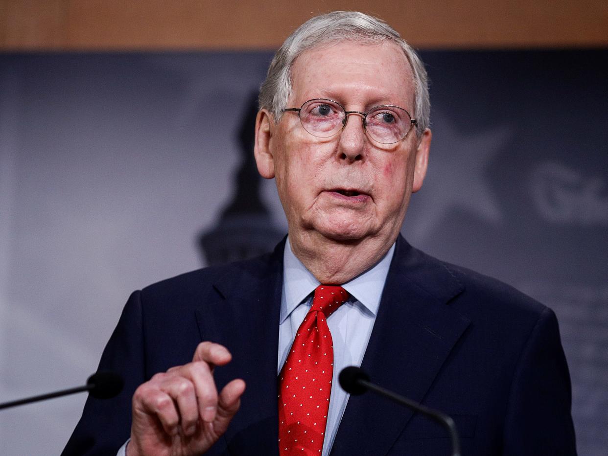 FILE PHOTO: U.S. Senate Majority Leader Mitch McConnell (R-KY) speaks to reporters after it was announced U.S. congressional leaders and the White House agreed on nearly $500 billion more in coronavirus relief for the U.S. economy, bringing to nearly $3 trillion the amount allocated to deal with the crisis, on Capitol Hill in Washington, U.S., April 21, 2020. REUTERS