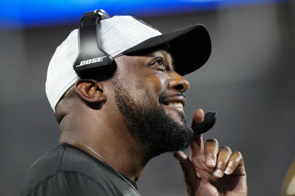 Pittsburgh Steelers head coach Mike Tomlin smiles during the second half of a preseason NFL football game against the Carolina Panthers Friday, Aug. 27, 2021, in Charlotte, N.C. (AP Photo/Jacob Kupferman)