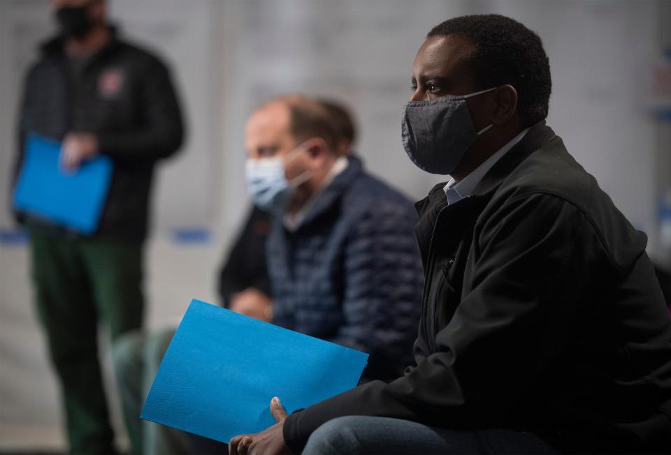 U.S. House Rep. Joe Neguse listens to a briefing on the East Troublesome Fire and the Cameron Peak Fire, the top two largest wildfires in Colorado history, at the Incident Command Center at the Budweiser Events Center in Loveland on Oct. 23, 2020.