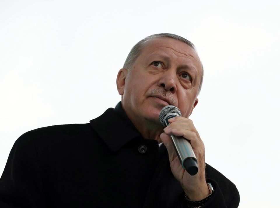 Turkey's President Recep Tayyip Erdogan addresses the supporters of his ruling Justice and Development Party, AKP, during a rally in Ankara, Turkey, Wednesday, March 13, 2019. Erdogan has laid in to Israeli Prime Minister Benjamin Netanyahu, calling him a "thief" and a "tyrant" in the latest spat between the two leaders.(Presidential Press Service via AP, Pool)