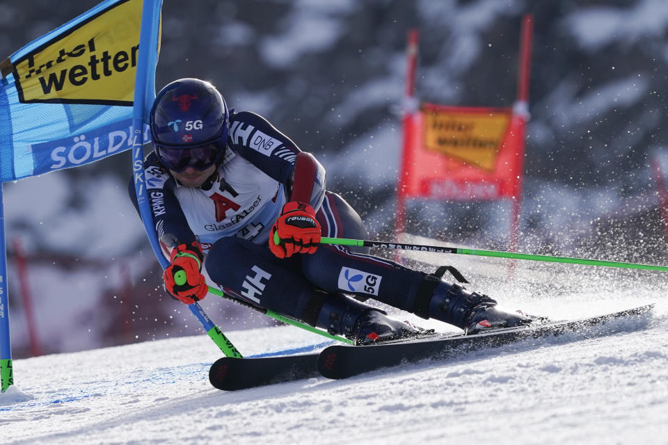 Norway's Henrik Kristoffersen speeds down the course during an alpine ski, men's World Cup giant slalom, in Soelden, Austria, Sunday, Oct. 23, 2022. (AP Photo/Giovanni Auletta)