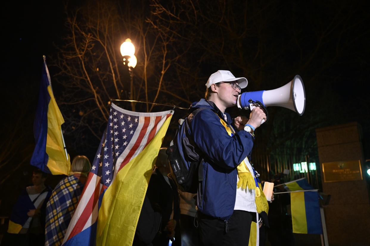 A group of Ukrainians living in the United States gather in front of the Russian Embassy in Washington on Thursday to protest the Russia-Ukraine war.