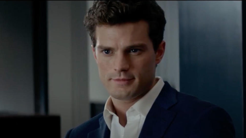 Jamie Dornan's Christian Grey being interviewed by Anastasia Steele in Fifty Shades of Grey