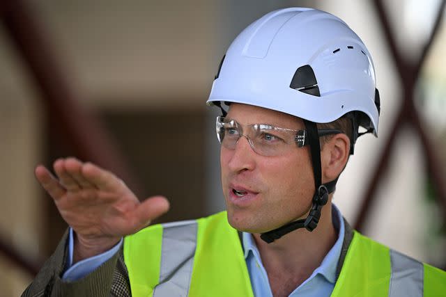 <p>JUSTIN TALLIS/POOL/AFP via Getty Images</p> Prince William wearing hard hat at the construction site in west London