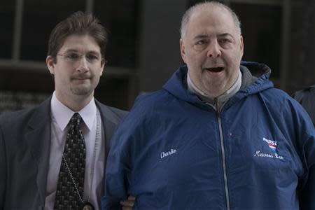 Bonanno family associate Charles Centaro (R), also known as Charlie Pepsi, is escorted by FBI agents from their Manhattan offices in New York February 11, 2014. REUTERS/Brendan McDermid