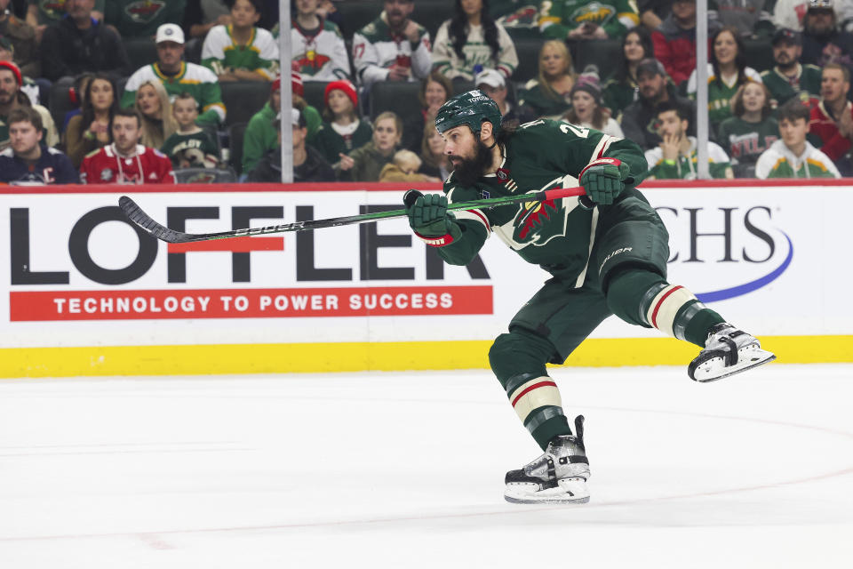 Minnesota Wild defenseman Zach Bogosianshoots the puck against the San Jose Sharks during the first period of an NHL hockey game, Sunday, March 3, 2024, in St. Paul, Minn. (AP Photo/Stacy Bengs)