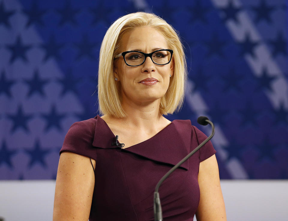 Representative Kyrsten Sinema goes over the rules in a television studio prior to a televised debate with Representative Martha McSally on Monday, October 15, 2018, in Phoenix. / Credit: AP