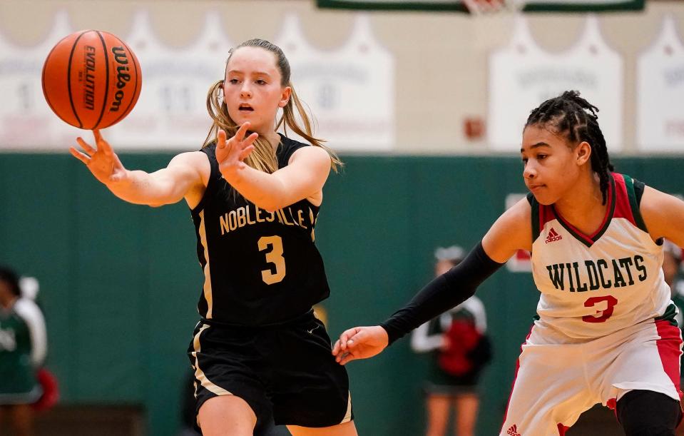 Noblesville Millers guard Kaitlyn Shoemaker (3) passes the ball Thursday, Nov. 4, 2021 at Lawrence North High School, in Indianapolis. The Noblesville Millers defeated the Lawrence North Wildcats, 81-56.