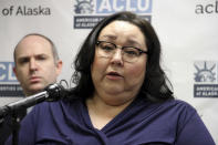 Clarice Hardy speaks at a news conference Thursday, Feb. 20, 2020, in Anchorage, Alaska. The American Civil Liberties Union of Alaska filed a lawsuit Thursday on Hardy's behalf against the City of Nome, Alaska, and two former officers for failing to investigate the sexual assault report filed by Hardy, a former police dispatcher. On the left is Joshua Decker, executive director of the ACLU of Alaska. (AP Photo/Mark Thiessen)