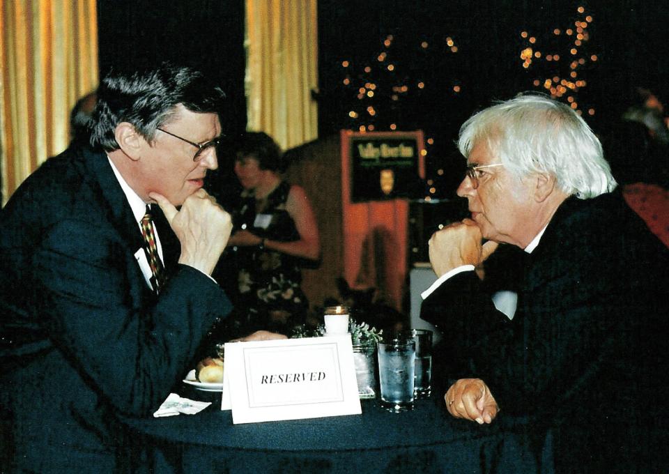 Co-founders of the Oregon Bach Festival, Royce Saltzman, left, and Helmuth Rilling are pictured talking.