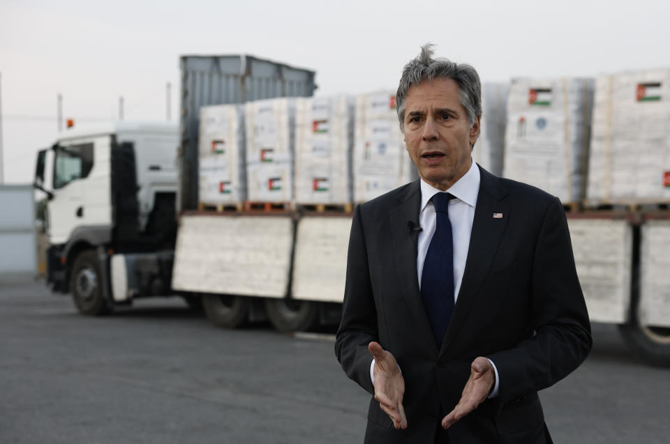U.S. Secretary of State Antony Blinken speaks to the press in front of a truck carrying humanitarian aid bound for Gaza at the Jordanian Hashemite Charity Organization in Amman, Jordan, Tuesday, April 30, 2024. (Evelyn Hockstein/Pool Photo via AP)