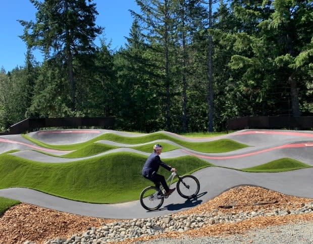 Langford mayor Stew Young tests out the new Jordie Lunn Bike Park, named in honour of the late Jordie Lunn, at the official opening on June 22, 2021. (Kathryn Marlow/CBC - image credit)