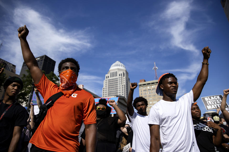 Image: Protesters march through downtown Louisville on June 5, 2020. (Brett Carlsen / Getty Images file)