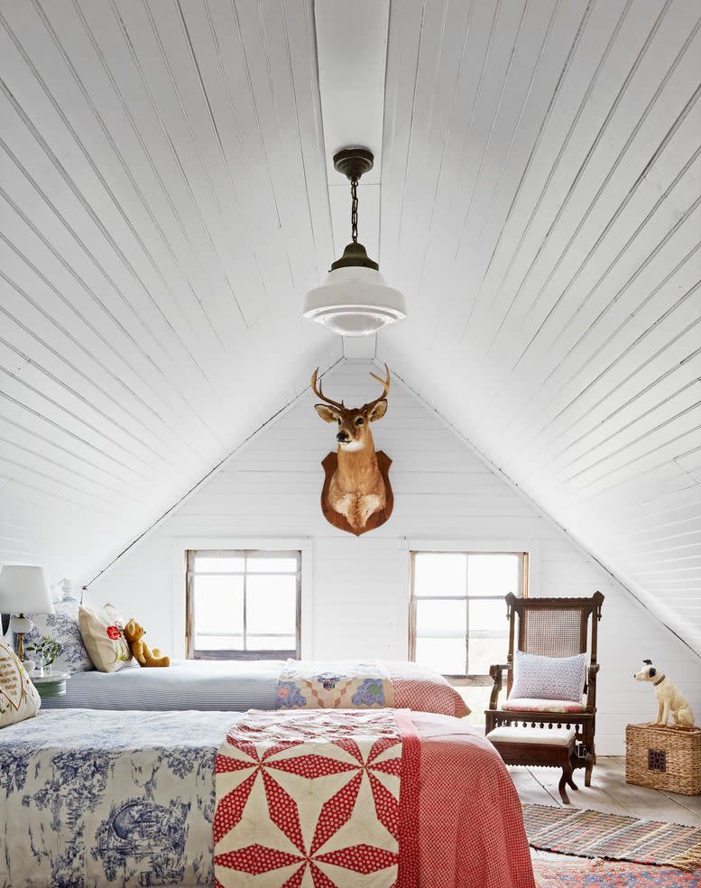 new york home of christina salway and her husband john moskowitz attic turned bunkroom housing five antique twin beds