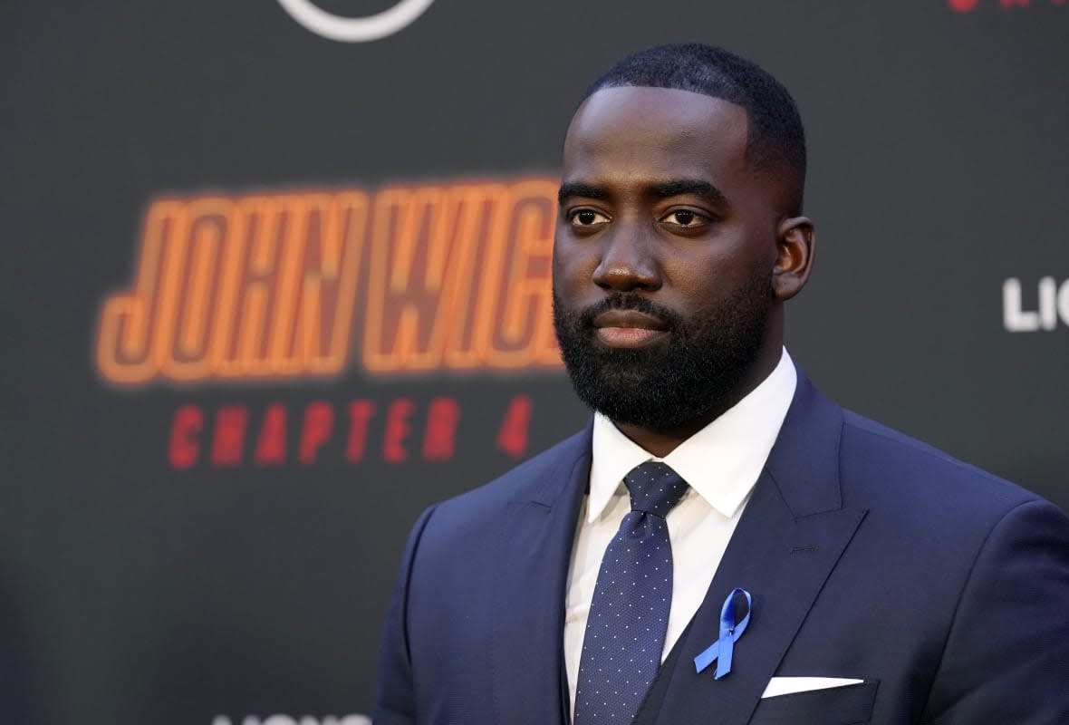 Shamier Anderson, a cast member in “John Wick: Chapter 4,” poses at the premiere of the film, Monday, March 20, 2023, at the TCL Chinese Theatre in Los Angeles. (AP Photo/Chris Pizzello)