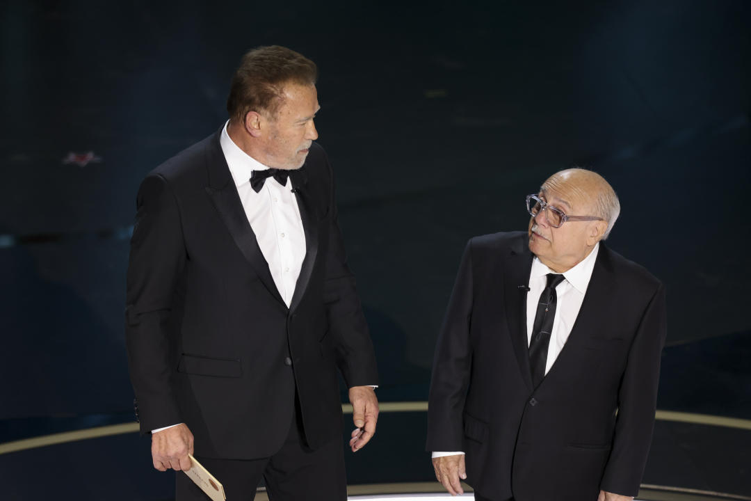 Arnold Schwarzenegger and Danny DeVito at the 96th Annual Oscars held at Dolby Theatre on March 10, 2024 in Los Angeles, California. (Photo by Rich Polk/Variety via Getty Images)