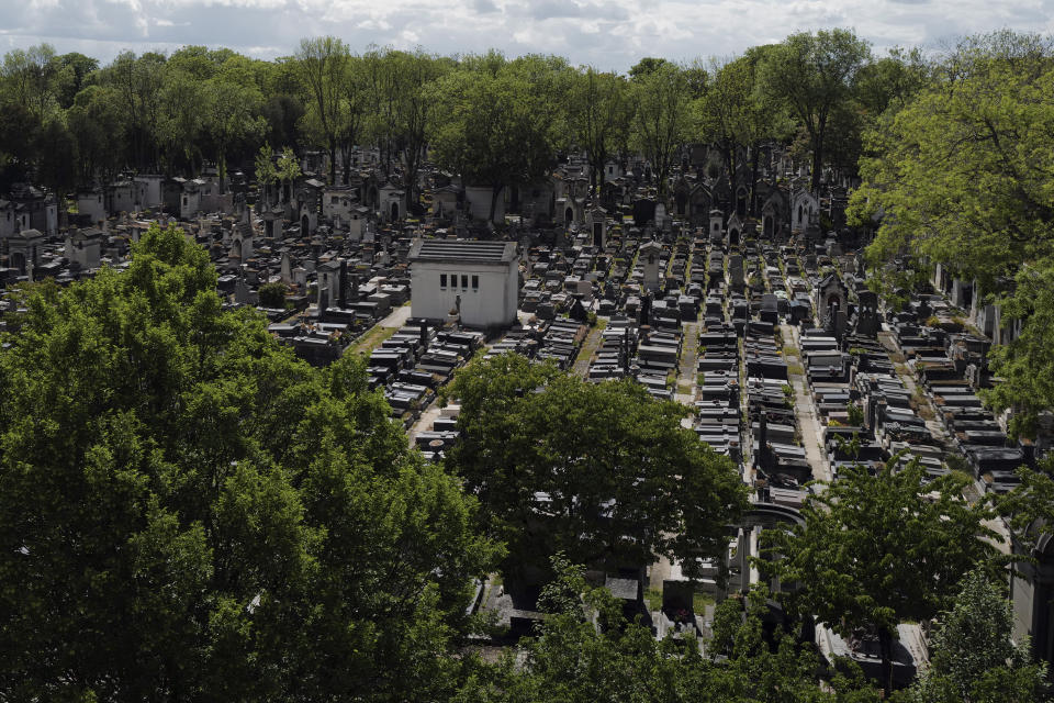An overview of the Pere Lachaise cemetery in Paris, Friday, May 1, 2020 as a nationwide confinement continues to counter the COVID-19 virus. The cemetery is the final resting place for a dizzying array of famous names: Edith Piaf, Oscar Wilde, Jim Morrison, to cite just those few. (AP Photo/Francois Mori)