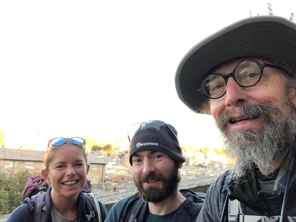 Father Moses and an American couple on the path to R.ome