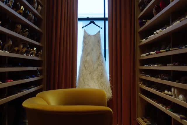 <p>Vogue/Youtube</p> Jenna Lyons' iconic white feather dress