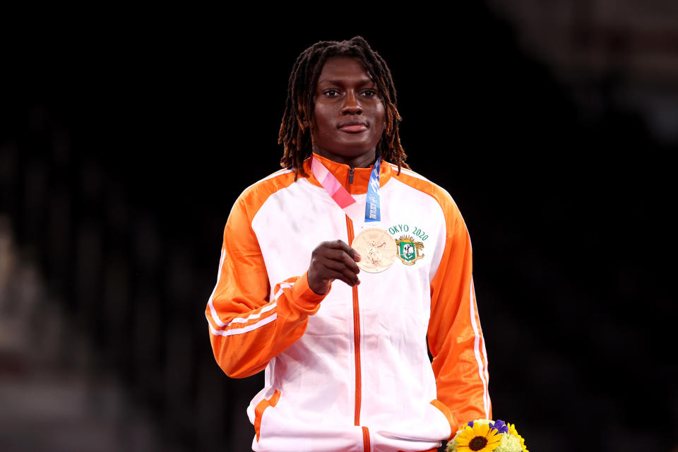 Ruth Gbagbi holds bronze medal