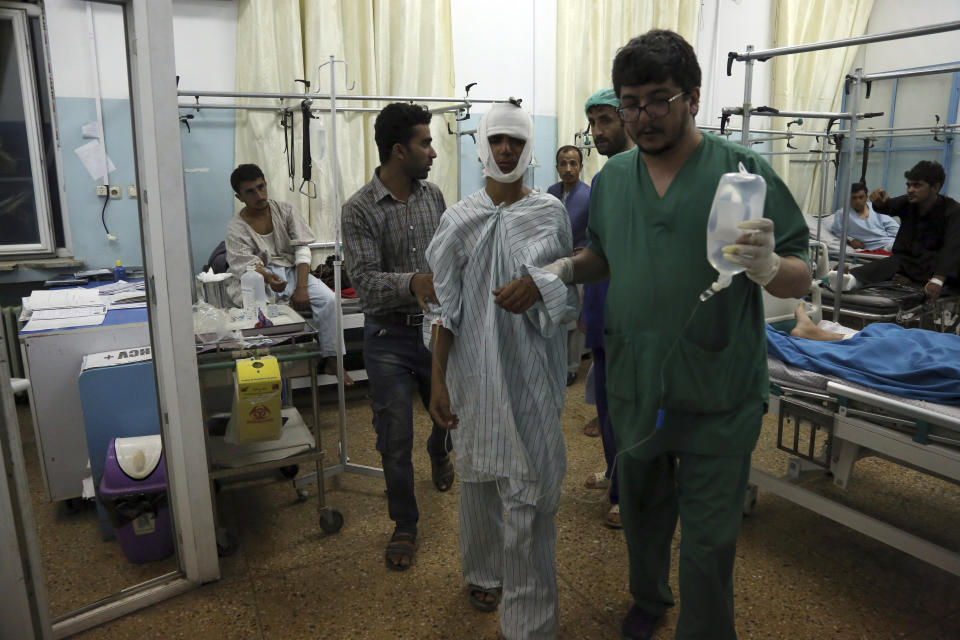 Wounded men receive treatment in a hospital, after a large explosion in Kabul, Afghanistan, Monday, Sept. 2, 2019. The Taliban claimed responsibility for a large explosion in the Afghan capital Monday night, which government officials said targeted an area home to several international organizations and guesthouses. (AP Photo/Rahmat Gul)
