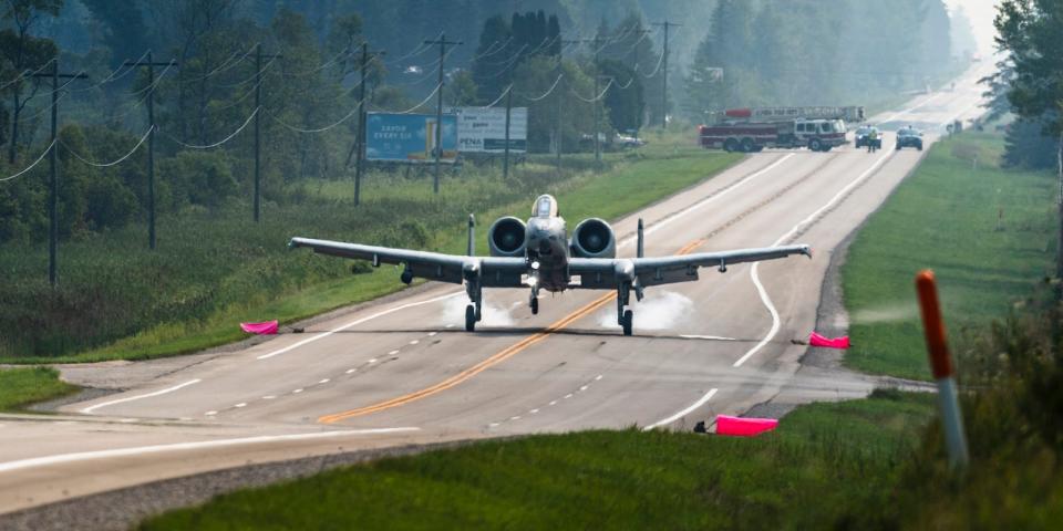 An A-10 on highway in Michigan