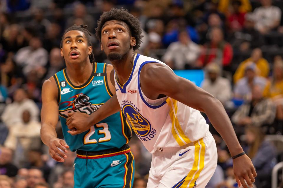 Golden State Warriors center James Wiseman blocks out Detroit Pistons guard Jaden Ivey after a free throw during  the second half at Little Caesars Arena, Oct. 30, 2022.